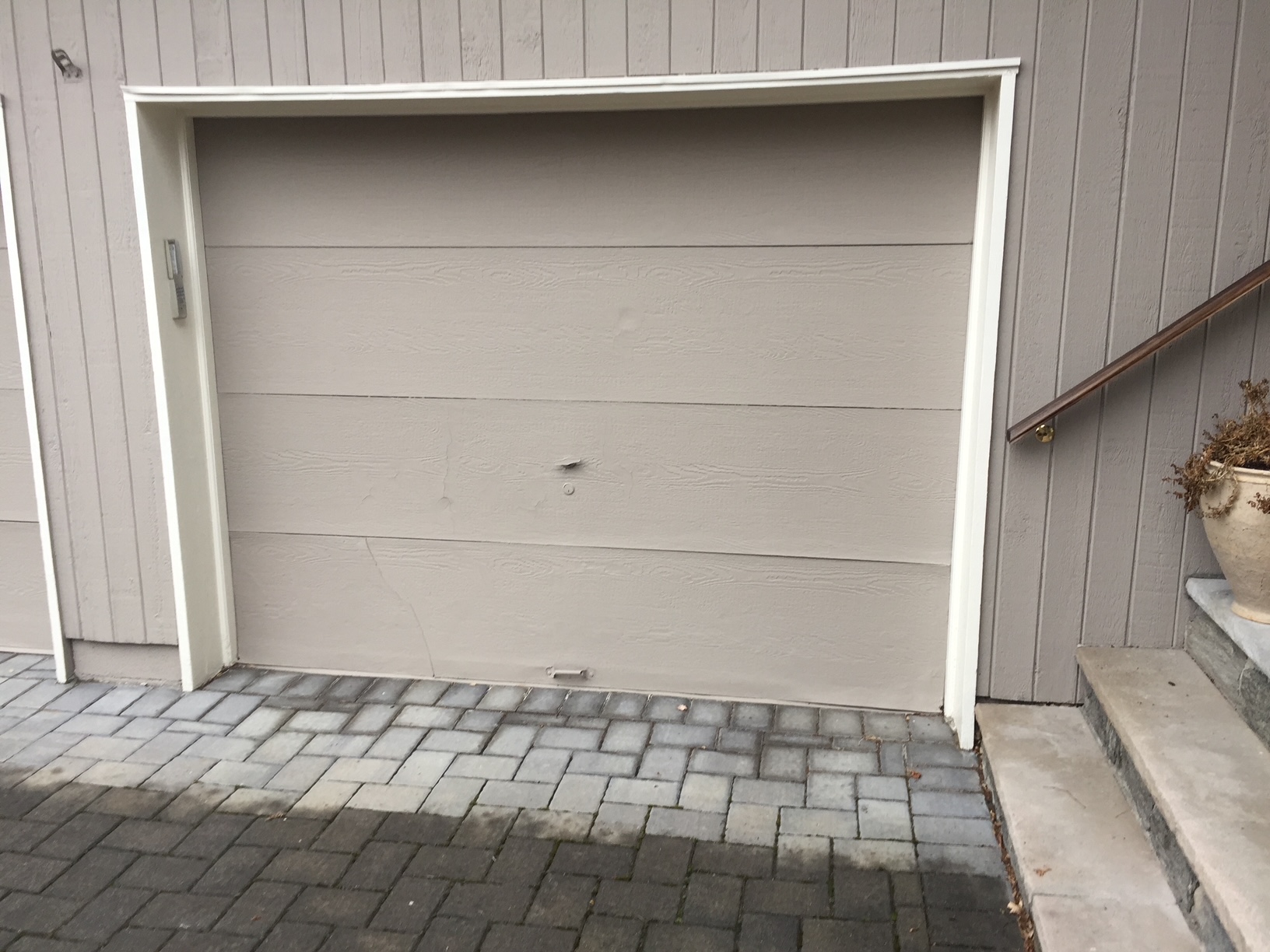 When is it time to replace a garage door?